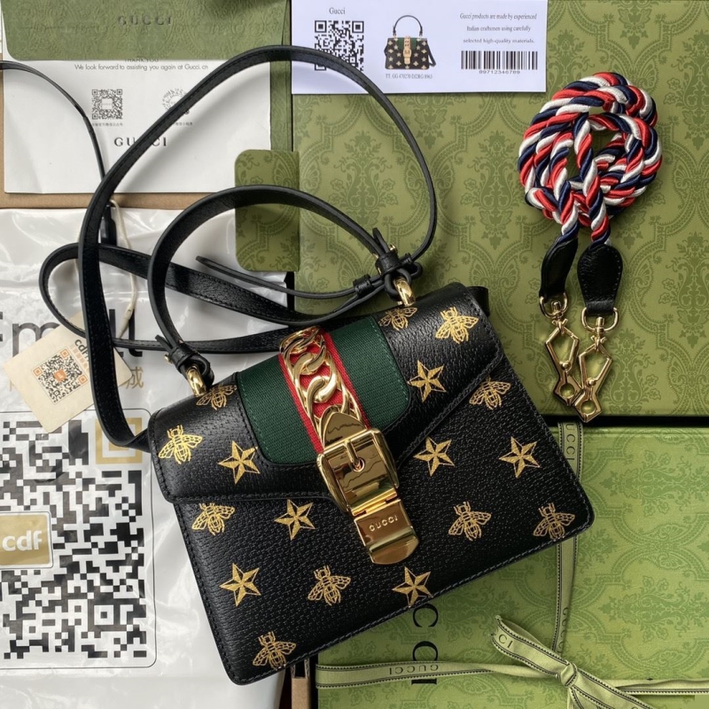 G*u*i satchel bags